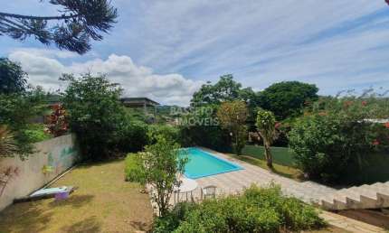 Casa com 3 quartos à venda na Rodovia Haroldo Soares Glavan, 3290, Cacupé, Florianópolis por R$ 2.800.000