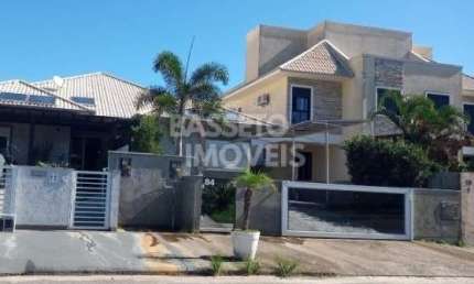 Casa em condomínio fechado com 3 quartos à venda na Rua do Ipê da Várzea, 84, Cachoeira do Bom Jesus, Florianópolis por R$ 1.400.000