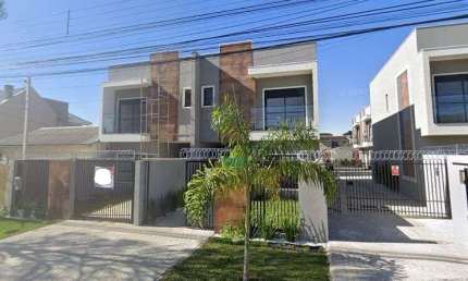 Sobrado novo de frente para rua, com 3 quartos sendo uma suíte