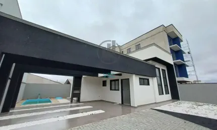 Casa térrea nova com piscina, 3 quartos sendo um deles com suíte e 5 vagas