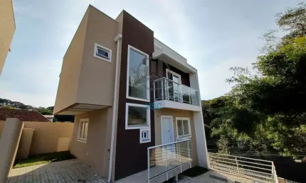 Sobrado novo em condomínio, 3 quartos sendo uma suíte e 2 vagas