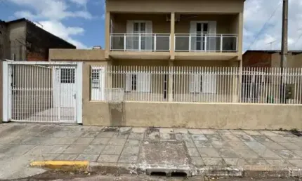 Casa com 3 quartos à venda na Padre Urbano Thiesen, 36, Parque Santo Inácio, Esteio por R$ 432.000