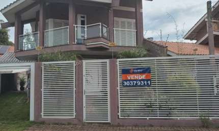 Casa com 4 quartos à venda na Das Nacoes, 69, Centro, Esteio por R$ 1.500.000