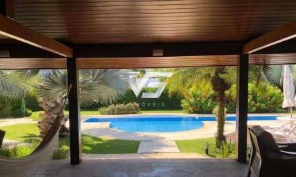 CASA EM JURERÊ COM 300M² DE ÁREA CONSTRUÍDA TERRENO DE 900M²