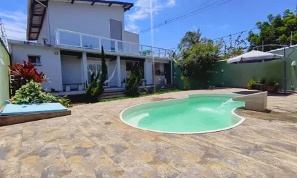 Casa a 100 metros da praia em itanhaém com piscina balneário tupy
