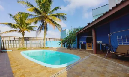 Casa no condomínio ipanema itanhaem com piscina e vista para o mar
