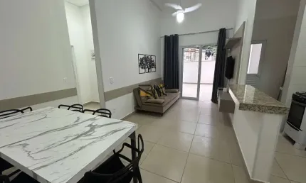 Apartamento praia grande com 2 dormitórios sendo 1 suíte,1 vaga de garagem,varanda gourmet, 1 banheiro social.