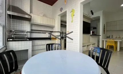 Apartamento nas toninhas com 2 dormitórios sendo 1 suíte,2 vagas de garagem,varanda gourmet com churrasqueira,sala 2 ambientes