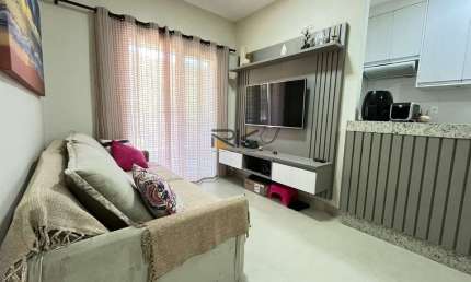 APARTAMENTO PRAIA GRANDE com 2 dormitórios sendo 1 suíte,1 vaga de garagem,varanda gourmet com churrasqueira,sala 2 ambientes