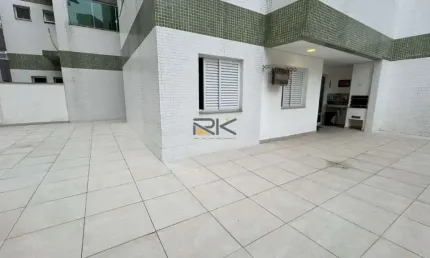 APARTAMENTO PRAIA GRANDE com 2 dormitórios sendo 1 suíte,1 vaga de garagem,varanda gourmet com churrasqueira e quintal