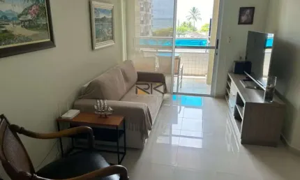 APARTAMENTO PRAIA GRANDE com 2 dormitórios sendo 1 suíte,1 vaga de garagem,varanda gourmet com churrasqueira,sala 2 ambientes