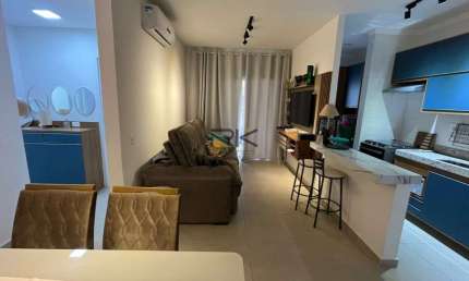 APARTAMENTO PRAIA GRANDE com 2 dormitórios sendo 1 suíte,1 vaga de garagem,varanda gourmet com churrasqueira,sala 2 ambientes