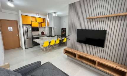 APARTAMENTO PRAIA GRANDE com 2 dormitórios sendo 1 suíte,1 vaga de garagem,sala 2 ambientes