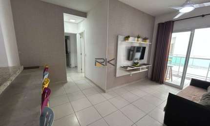 APARTAMENTO PRAIA GRANDE com 2 dormitórios sendo 1 suíte,1 vaga de garagem,varanda gourmet com churrasqueira,sala 2 ambientes