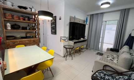 APARTAMENTO PRAIA GRANDE com 2 dormitórios sendo 1 suíte,1 vaga de garagem,sala 2 ambientes,varanda gourmet com churrasqueira
