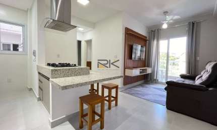 APARTAMENTO PRAIA GRANDE com 2 dormitórios sendo 1 suíte,1 vaga de garagem,varanda gourmet com churrasqueira
