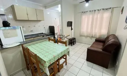 APARTAMENTO PRAIA GRANDE com 2 dormitórios sendo 1 suíte,1 vaga de garagem,sala 2 ambientes,60 metros da orla