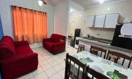 APARTAMENTO PRAIA GRANDE com 2 dormitórios sendo 1 suíte,1 vaga de garagem,cozinha,lavanderia e garagem