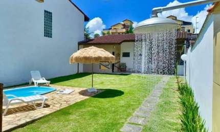 CASA A VENDA NAS TONINHAS COM 2 DORMITÓRIOS SENDO 1 SUÍTE,SALA DE ESTAR,COZINHA E 2 VAGAS DE GARAGEM