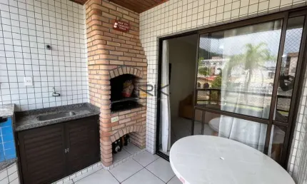 APARTAMENTO PRAIA GRANDE com 2 dormitórios sendo 1 suíte,1 vaga de garagem,varanda gourmet com churrasqueira