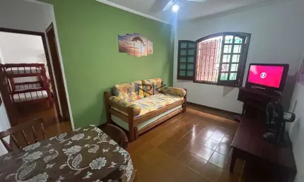 APARTAMENTO PRAIA GRANDE com 1 dormitório,1 vaga de garagem,sala de estar e cozinha