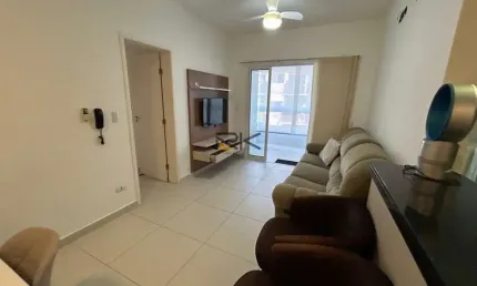 Apartamento nas toninhas com 2 dormitórios sendo 1 suíte,sala 2 ambientes,varanda gourmet com churrasqueira