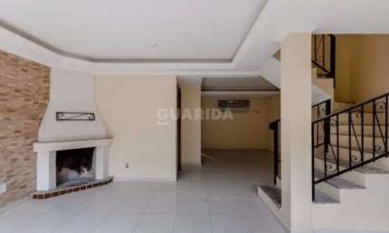 Casa Residencial com 3 dormitórios suítes, no bairro Tristeza