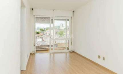 Apartamento com 1 dormitório e 1 vaga de garagem, no bairro Partenon