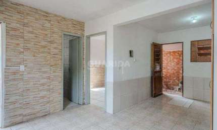 Casa em condomínio com 1 dormitório para alugar no bairro Tristeza