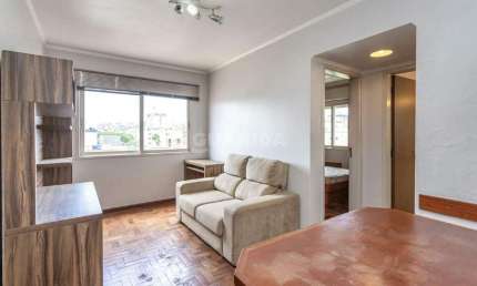Apartamento mobiliado com 1 dormitório e 1 vaga de garagem no bairro Santana