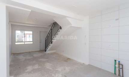 Casa em Condomínio com 2 dormitórios e 1 vaga de garagem no bairro Vila Nova