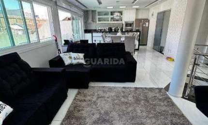 Casa Residencial com 3 dormitórios, sendo 1 suíte, e 5 vagas de garagem no bairro Jardim Leopoldina