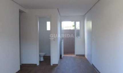 Casa em condomínio com 2 dormitórios e 1 vaga de garagem no Bairro Hípica