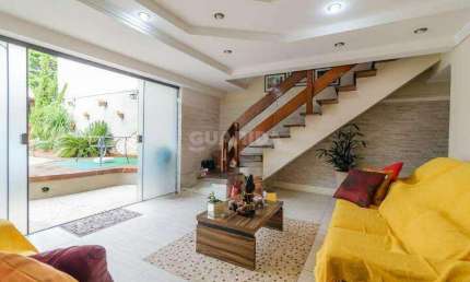 Casa Residencial com 5 dormitórios, sendo 3 suítes, para alugar no bairro Partenon
