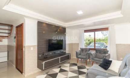 Casa com 3 dormitórios, sendo 1 suíte, para alugar no bairro Guarujá
