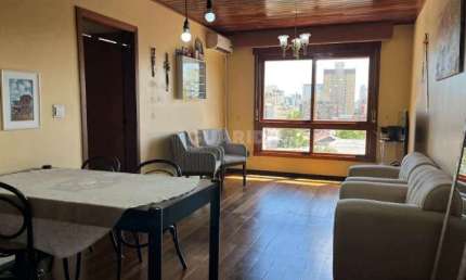 Cobertura com piscina, mobiliada com 3 dormitórios, sendo 1 suíte, no bairro Menino Deus