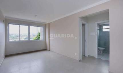 Apartamento com 2 dormitórios, 1 suíte e 2 vagas de garagem no bairro Petrópolis