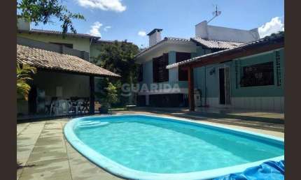 Casa de 4 dormitórios mobiliada no Bairro Cristo Redentor.