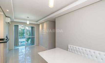 Apartamento semimobiliado com 3 dormitórios, sendo 1 suíte, no bairro Tristeza