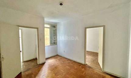 Apartamento com 1 dormitório suíte para alugar no bairro Centro.