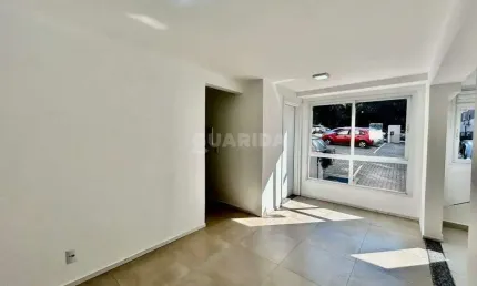 Apartamento térreo com 2 dormitórios e 1 vaga de garagem no bairro Vila Nova - Porto Alegre/RS