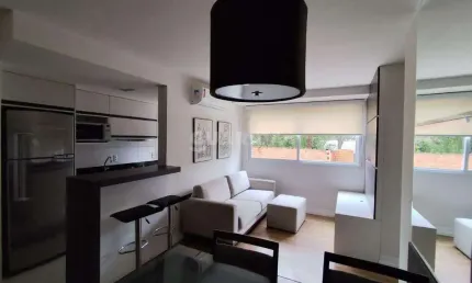 Apartamento mobiliado com 2 dormitórios e 1 vaga de garagem no bairro Vila Nova - Porto Alegre/RS