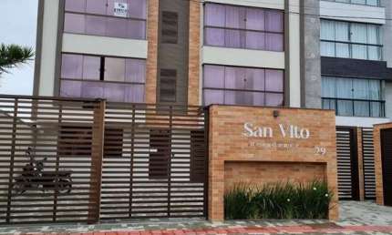 Apartamento com 01 suíte + 02 dormitórios, 02 vagas cobertas no centro.