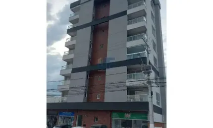 Apartamento com 2 dormitórios sendo uma suíte, sacada com churrasqueira Camboriú