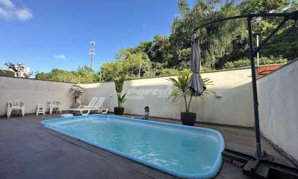 Casa em condomínio fechado com 3 quartos para alugar no Centro, Balneário Piçarras , 160 m2 por R$ 7.200