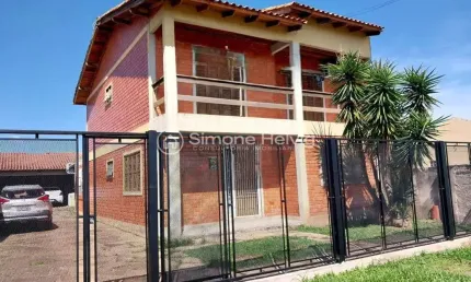 Casa com 4 quartos à venda na Silvio de Freitas Remédio, 68, Parque 35, Guaíba por R$ 749.000