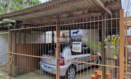 Casa com 3 quartos à venda na Y2, 227, Morada da Colina, Guaíba por R$ 318.000