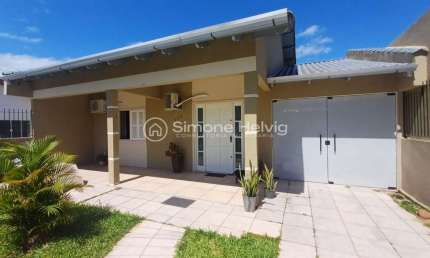 Casa com 3 quartos à venda na Avenida Ponche Verde, 175, Jardim dos Lagos, Guaíba por R$ 600.000