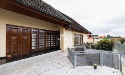 Casa à venda com 4 quartos no bairro Guabirotuba em Curitiba
