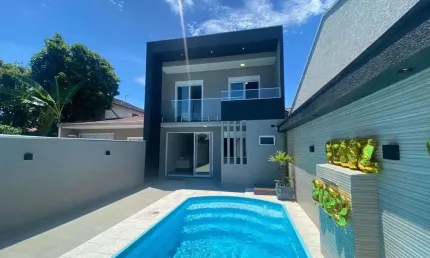 Sobrado contendo 4 dormitórios sendo 1 suíte - Piscina e espaço goutmet.